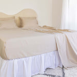 King/Queen Bamboo Cotton sheet set in beige styled on bed