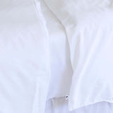 close up of twin single bamboo cotton Quilt cover set in white styled on bed