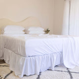 King/Queen bamboo cotton sheet set in white styled on bed