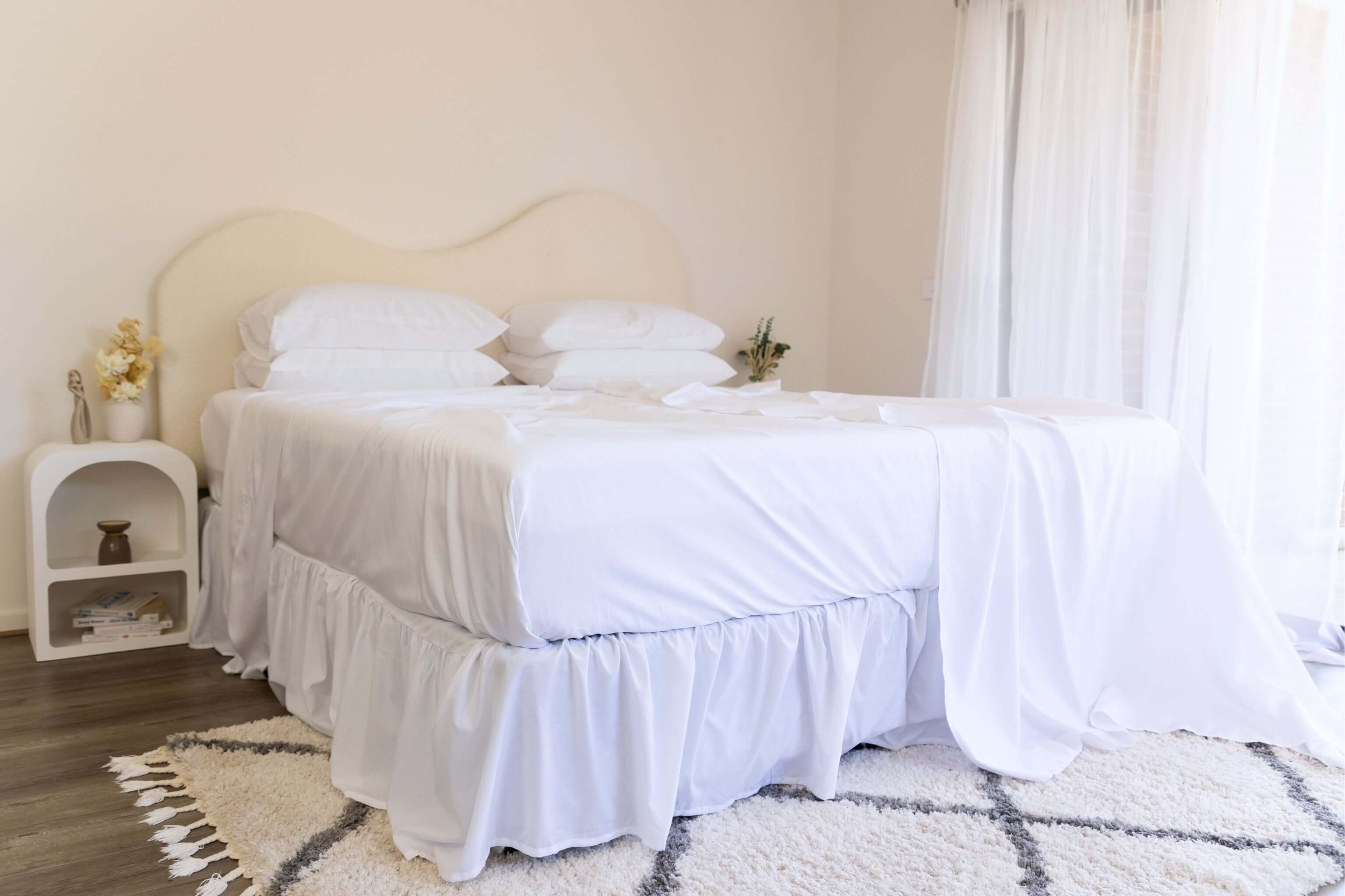 King/Queen bamboo cotton sheet set in white styled on bed