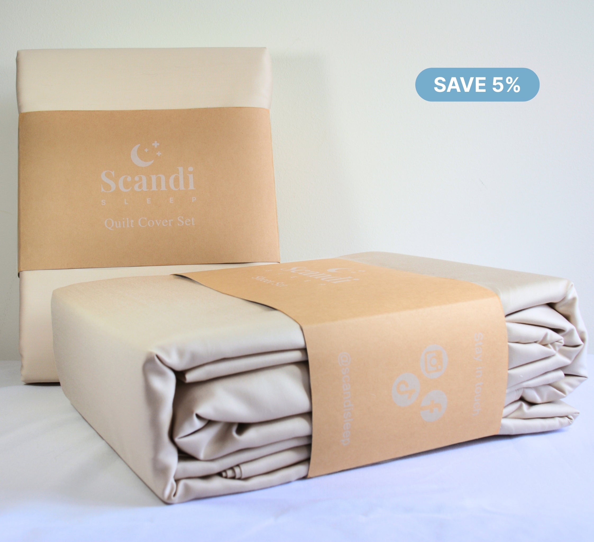 Folded beige quilt cover set with packaging and 'Scandi' branding on a light background. Save 5%