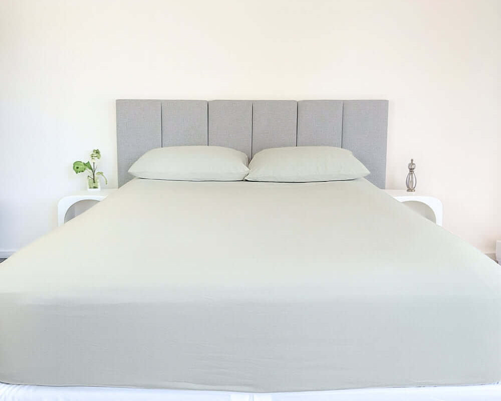 bed styles with grey sage fitted sheet and 2 matching pillows with grey headboard