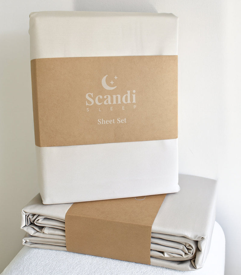 Scandi Sheets packaging with beige Sheet set and quilt cover set on a white background