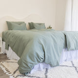 Twin single bamboo cotton quilt cover set in eucalyptus green styled on bed