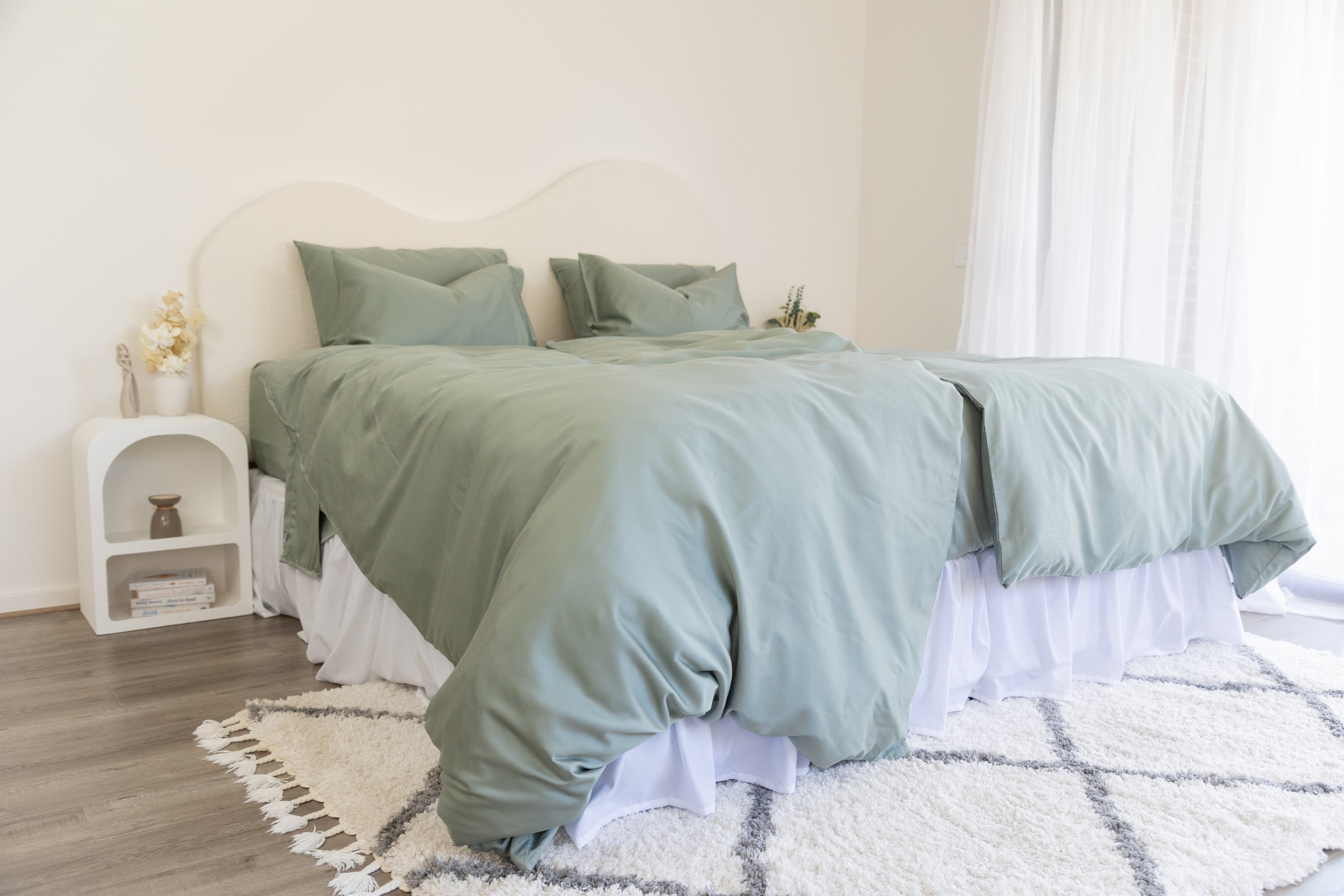 Twin single bamboo cotton quilt cover set in eucalyptus green styled on bed
